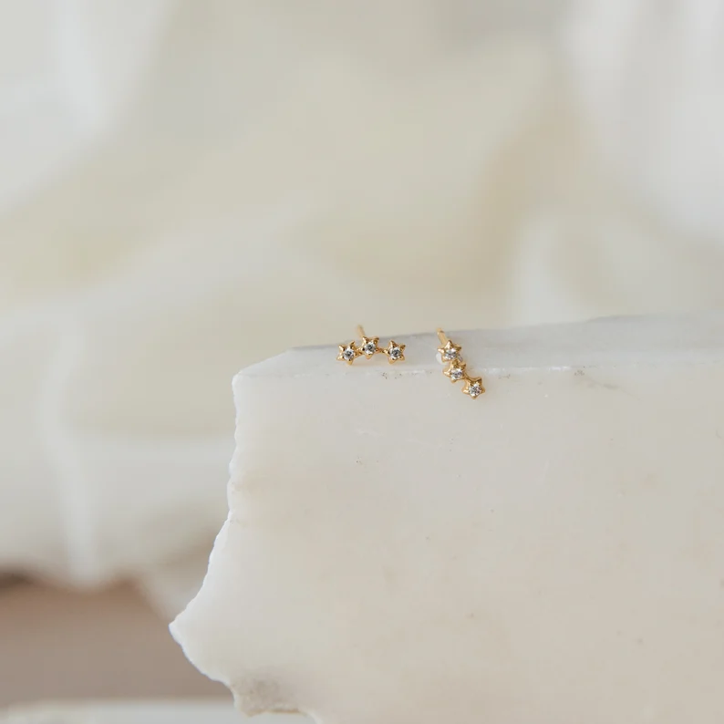 400548_5ee2396710134286a72637d37320bb3cmv2.webp 925 Silver Stella Star Earrings Studs - Image 1